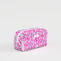 Pink floral toiletry bag on a white background