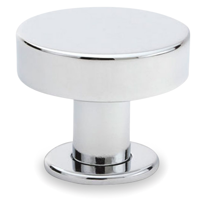 A sleek and contemporary round knob with a flat face.
