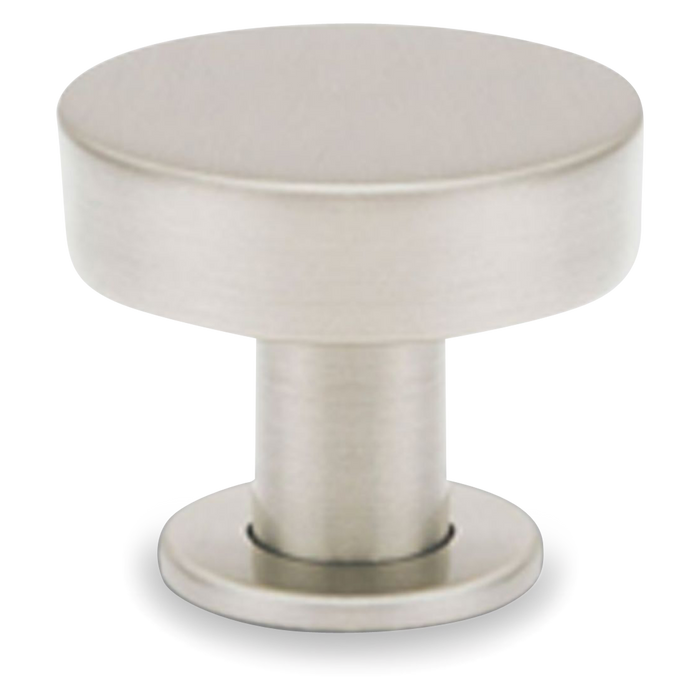 A sleek and contemporary round knob with a flat face.