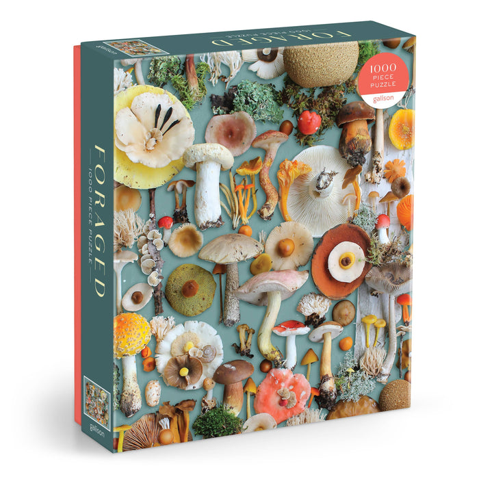 A 1000 piece puzzle box featuring a vibrant and detailed image of various mushrooms on a grey background, with the product title 'Foraged' visible.