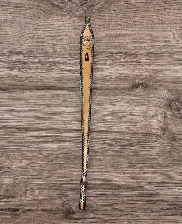 Hand tooled sling