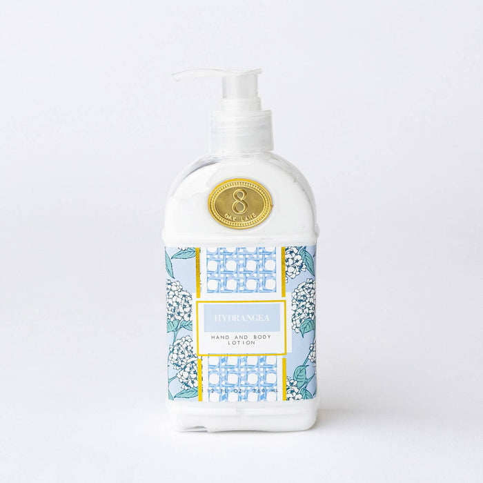 Lotion bottle with decorative label on a white background