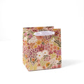 Floral-patterned gift bag on a white background