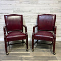 Set Of 2 Red Leather Accent Chairs On Wheels