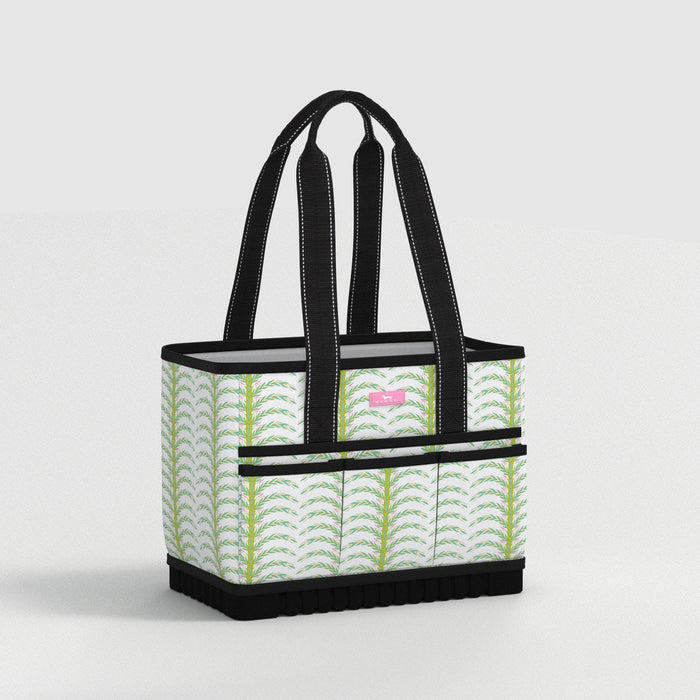 Tote bag with green leaf pattern on a light gray background
