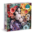 A 500 piece puzzle box featuring a vibrant collage of various colorful mushrooms on a grey background.