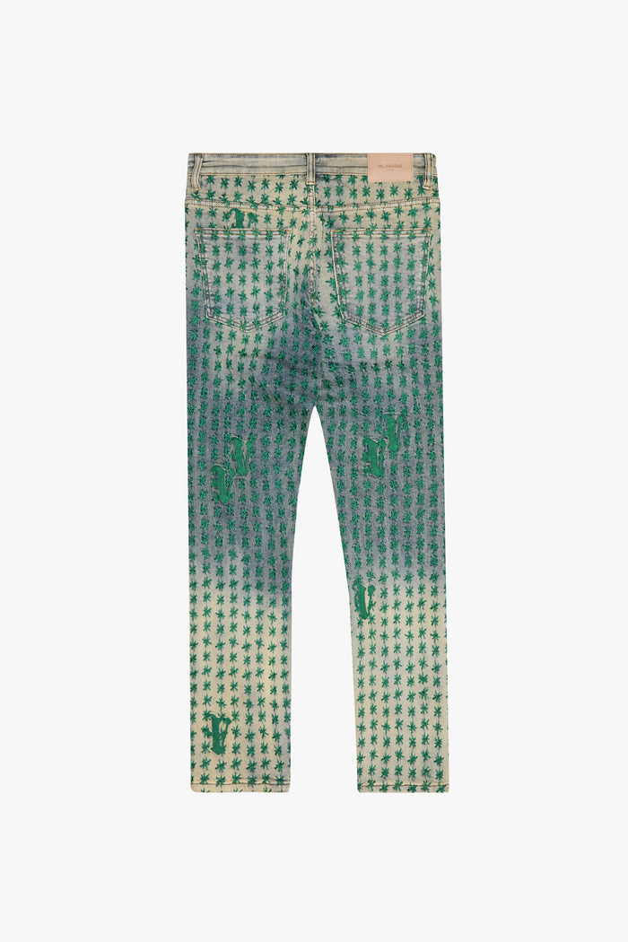 Close-up of Valabasas Asterisk Blue/Green Stacked Flare Jeans showing the unique stacked flare silhouette